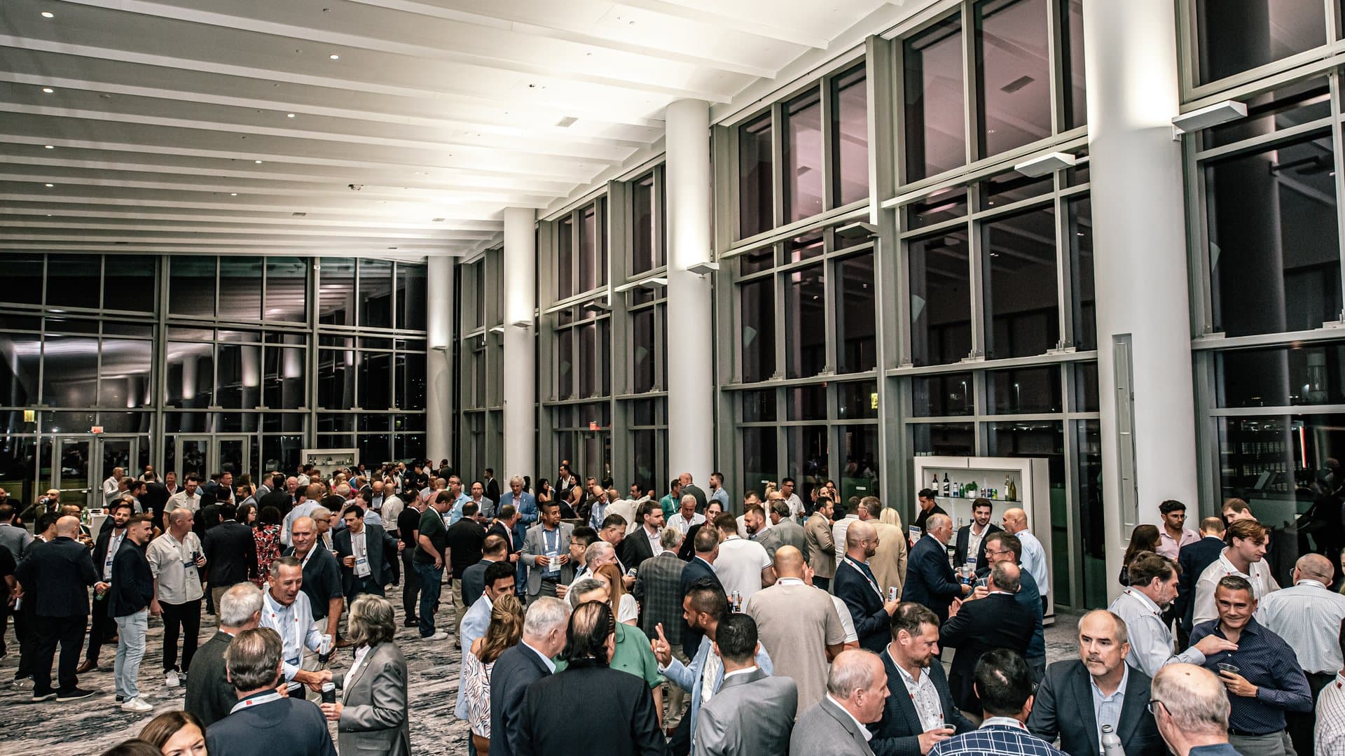 Delegates gathered in the daylit concourse of the Miami Beach Convention Center