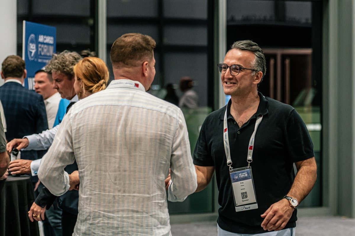 Delegates networking with drinks at an Air Cargo Forum reception