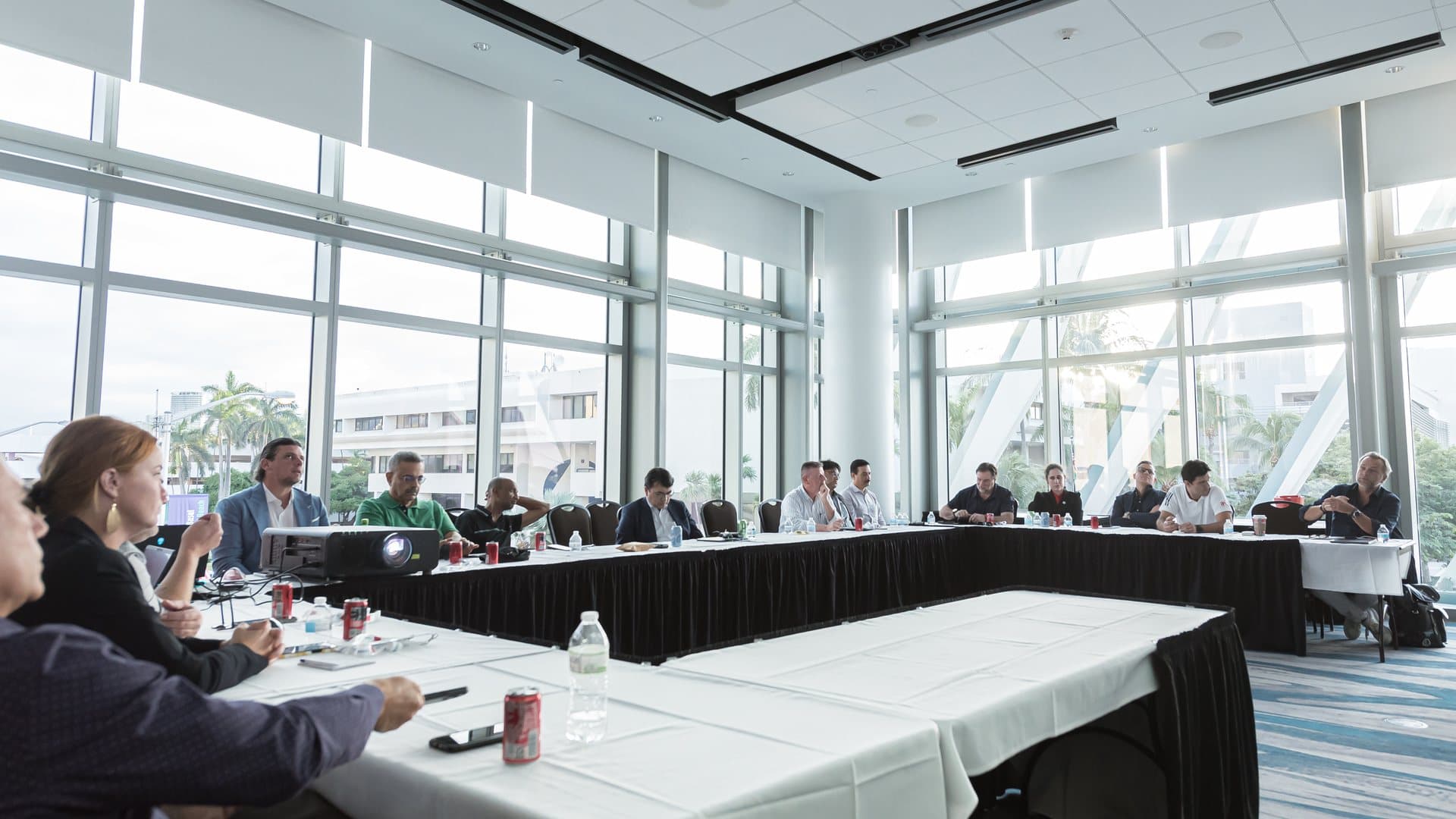 A TIACA Executive Summit working session in a daylit boardroom